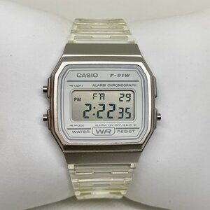 Casio 593 F-91W Watch Unisex 33mm Silver Tone Digital alarm chronograph running